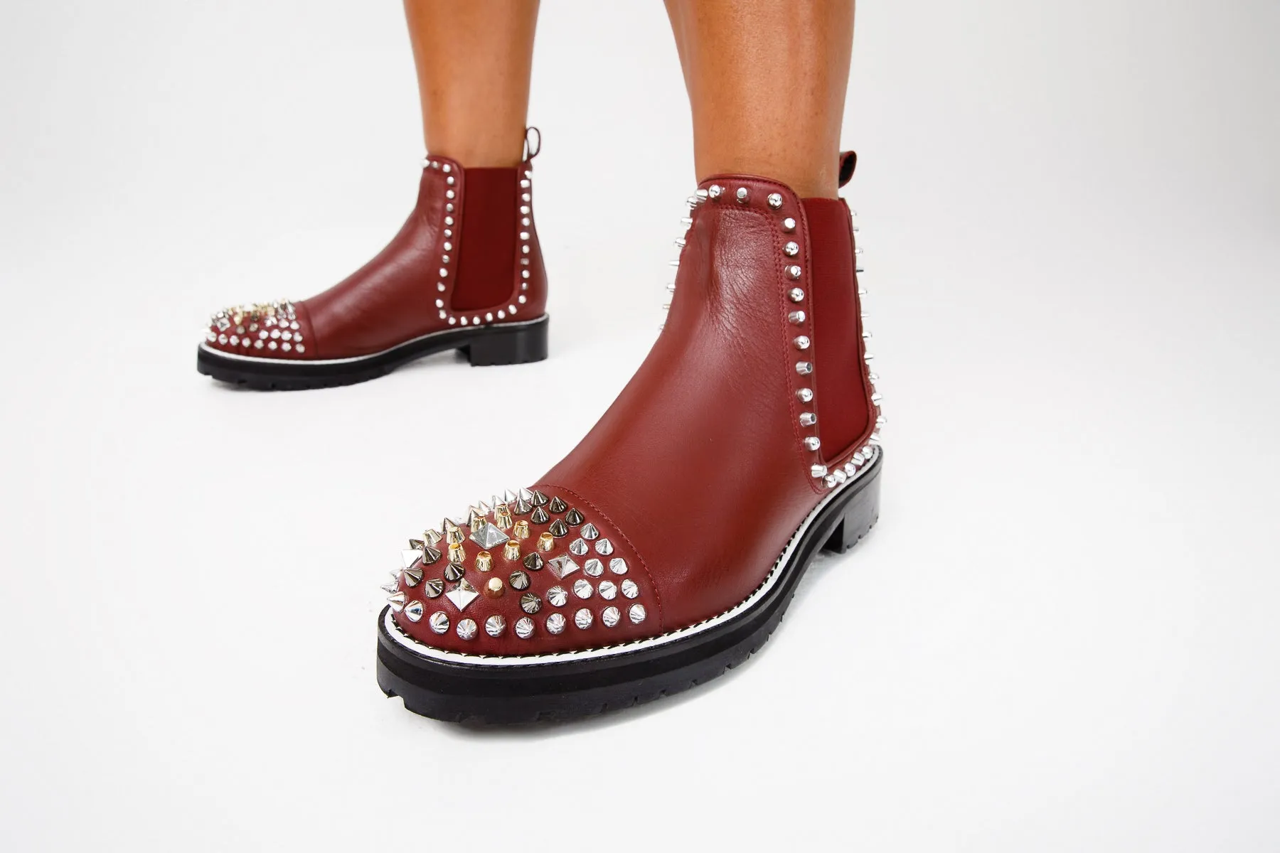 The Vuvulane Burgundy Spike Leather Ankle Women  Boot